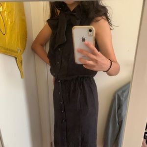 Black sleeveless button down dress with bow